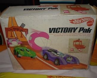 The Hot Wheels Victory Pak in it's Original Box. Goes with the entire Hot Wheels Collection! Details listed under each Hot Wheels Car.