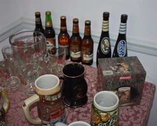 Collectible Beer Bottles and Steins plus Coors Pitcher and matching Glasses