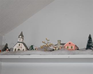 Department 56 Christmas and Halloween Village Pieces displayed on Shelving Unit running around the Living Room. Beautiful Lighted Display! All will sell separately or perhaps you would prefer to purchase the entire set!?!