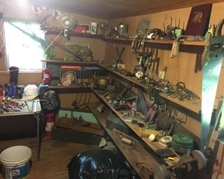 Room full of vintage tools. Two 6ft Two Man Saws! Do you see the awesome toolbox down on the floor on the right hand side? That tray fits inside it... LOVE the look!