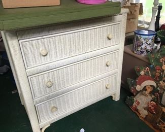 Wicker Dresser and nightstand made by Henry Link. Dresser is in great shape. Nightstand is missing part of the border around the top!