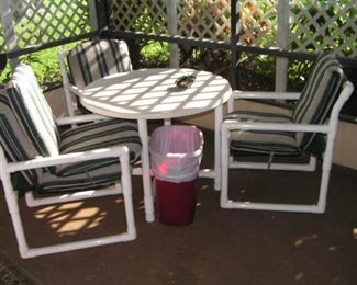 PVC table has 4 chairs
