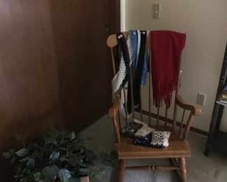 Wooden Rocker, artificial plants, women's scarves