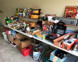 Many plastic totes, hand tools and misc. garage items
