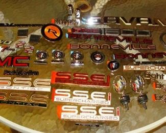 Vintage auto emblems, tags