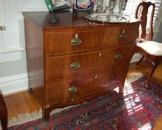 One of several chest of drawers