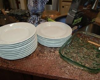 Stacks of white dinner plates