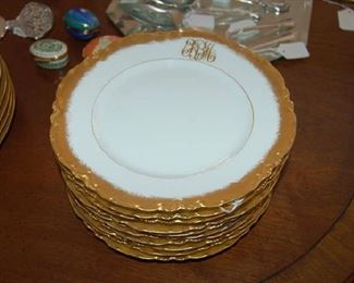 Gold trimmed plates by Haviland