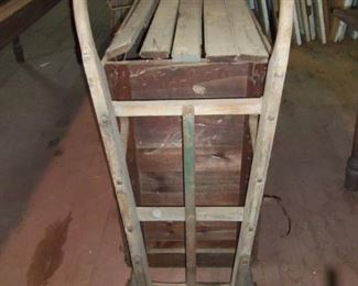 SMALL WOODEN  HAND TRUCKS USED AT R F STRICKLAND CO STORE