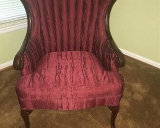 One of two wing back arm chairs 