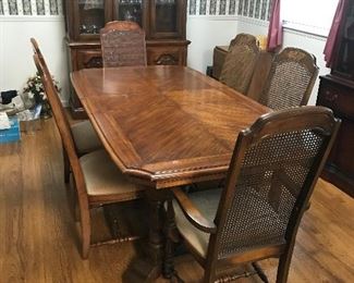 Large dining table/1 leaf - 40"X75",6 cane back chairs 