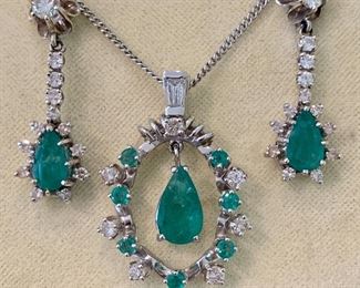 Elegant emerald and diamond demiparure. 