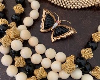 14K and 18K Gold and Onyx.