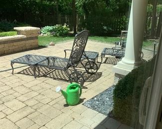 Outdoor patio set includes a table and chairs