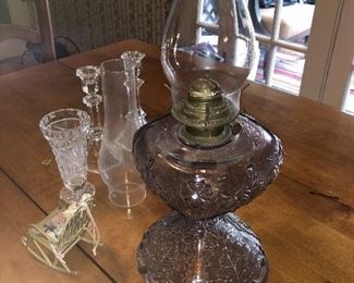 antique oil lamps and hurricane shades..