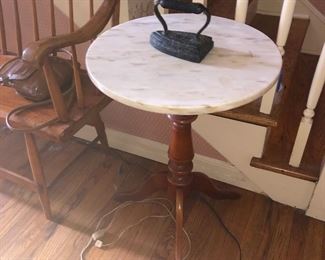 Marble side table and antique iron..