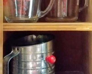 vintage glass liquid measuring cups; vintage Bromwell sifter