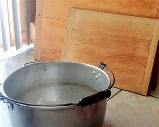 wooden cutting boards; large aluminum kettle pot with handle