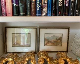 Books, gilt wood tie-backs 
Framed art