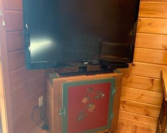 Many  TV's  all in great condition                                              Beautiful Painted Cabinet.