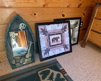 Many decorative items including mirrors and framed prints