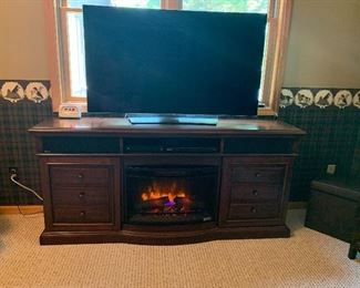 Fireplace entertainment cabinet