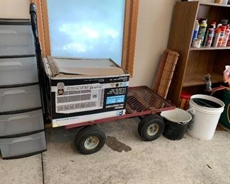 New air Conditioner in box never used.  Heavy duty metal wagon cart with sides  and large handle