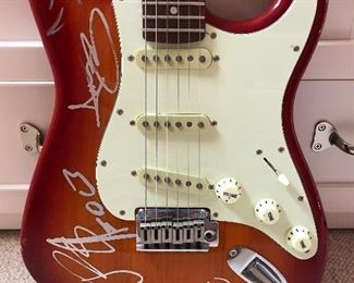 Autographed guitar by Fall Out Boy