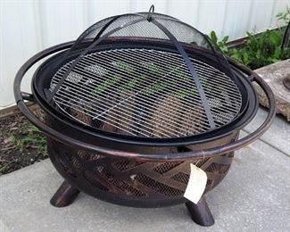 Metal Outdoor Stand-alone Fire Pit With Grill and Spark Top 18"H x 36" Dia.