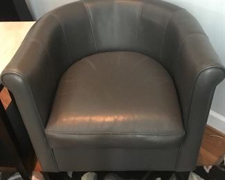 One of a pair of leather chairs