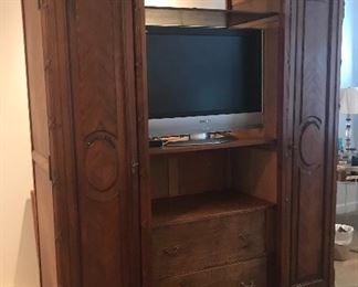 Antique armoire shown without it's mirrored center door