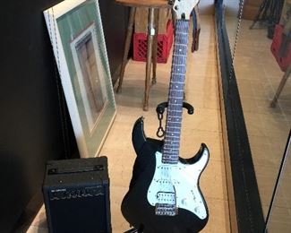 Yamaha EG 112C electric guitar - tunes out & plays also Yamaha YG 15 practice amp.