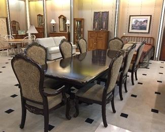 Formal dining table with 8 chairs and two leaves - 10' long with leaves. 