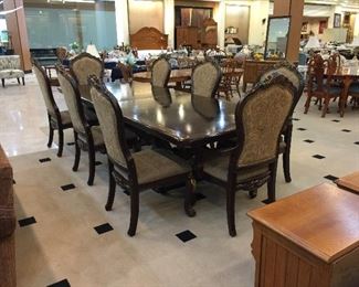 Formal dining table with 8 chairs and two leaves - 10' long with leaves. 