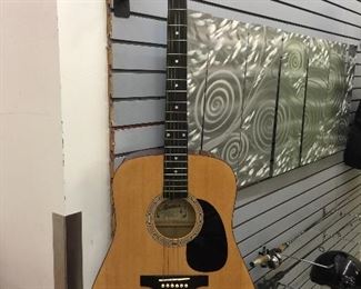 Montana full size acoustic guitar.