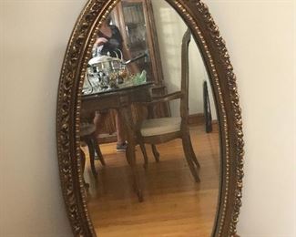 Oval gold mirror Buy now $60