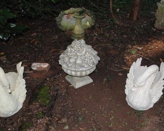 Birdbath, swans and fruit compote outdoor items - some kept inside until now