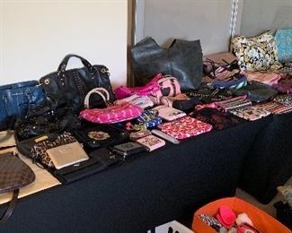 hundreds of high fashion pieces; Louis Vuitton, Prada, Juicy Couture, Coach, and more!