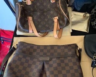 hundreds of high fashion pieces; Louis Vuitton, Prada, Juicy Couture, Coach, and more!
