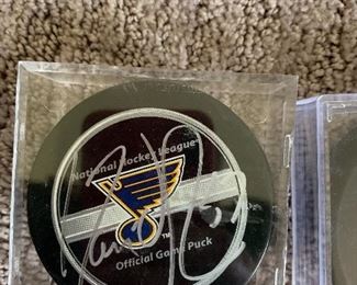 Many Signed St Louis Blues Hockey Pucks 