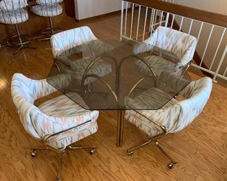 Octagon Glass Table w/ 5 Rolling Chairs	28x50x50	HxWxD