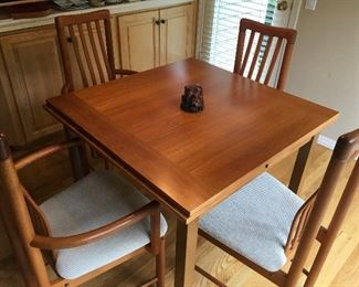 Danish mid-century modern teak dining table (in like-new condition) with teak Benny Linden chairs