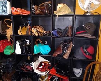 All kinds of purses. Dooney & Bourke, RL and more. Check out that cool leather owl One in the middle. He has been moved to the jewelry area for special display.
