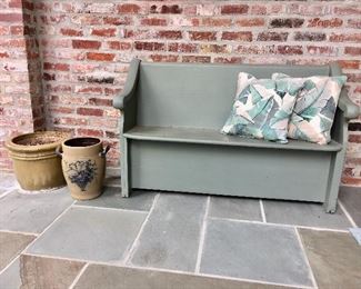 Information from the family is that this was a church pew....Their dad painted it