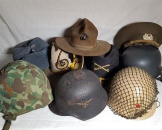 Militaria Helmets including German WWII US Camouflage, Russian Cap and more