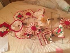 lot of potholders and MANY linens & Quilts, Christmas table cloths, numerous Dollies are hand washed AND placed in zip lockbags