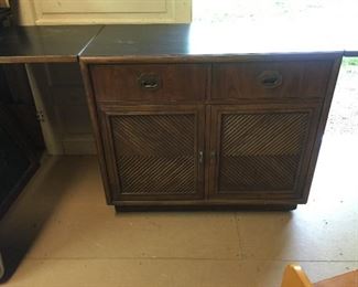 Beautiful buffet the top is tri fold and when you open the bottom it become a mini bar!!