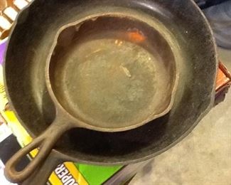 Several Cast iron pieces, skillets, corn muffin pans, dutch oven skillets several sizes