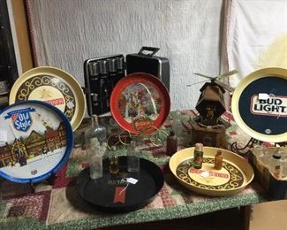 Pub and brew there are beer steins with some of the firefighting items, Middle tray has St. Louis on it and the Arch, rust on still a nice piece