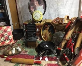 Red kitchen utensils Many cookbooks, Old Coca Cola products, picnic baskets Ceramic yellow kitchen clock runs